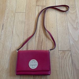 Red Kate Spade bag. Good condition.
